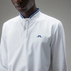 J.Lindeberg Tyson Long Sleeve Golf Polo Shirt -FootJoy Sales Store J.Lindeberg Tyson LS Reg Fit Polo GMJT07801 0000 SHLIN154 WhiteNavy Peony Model 2